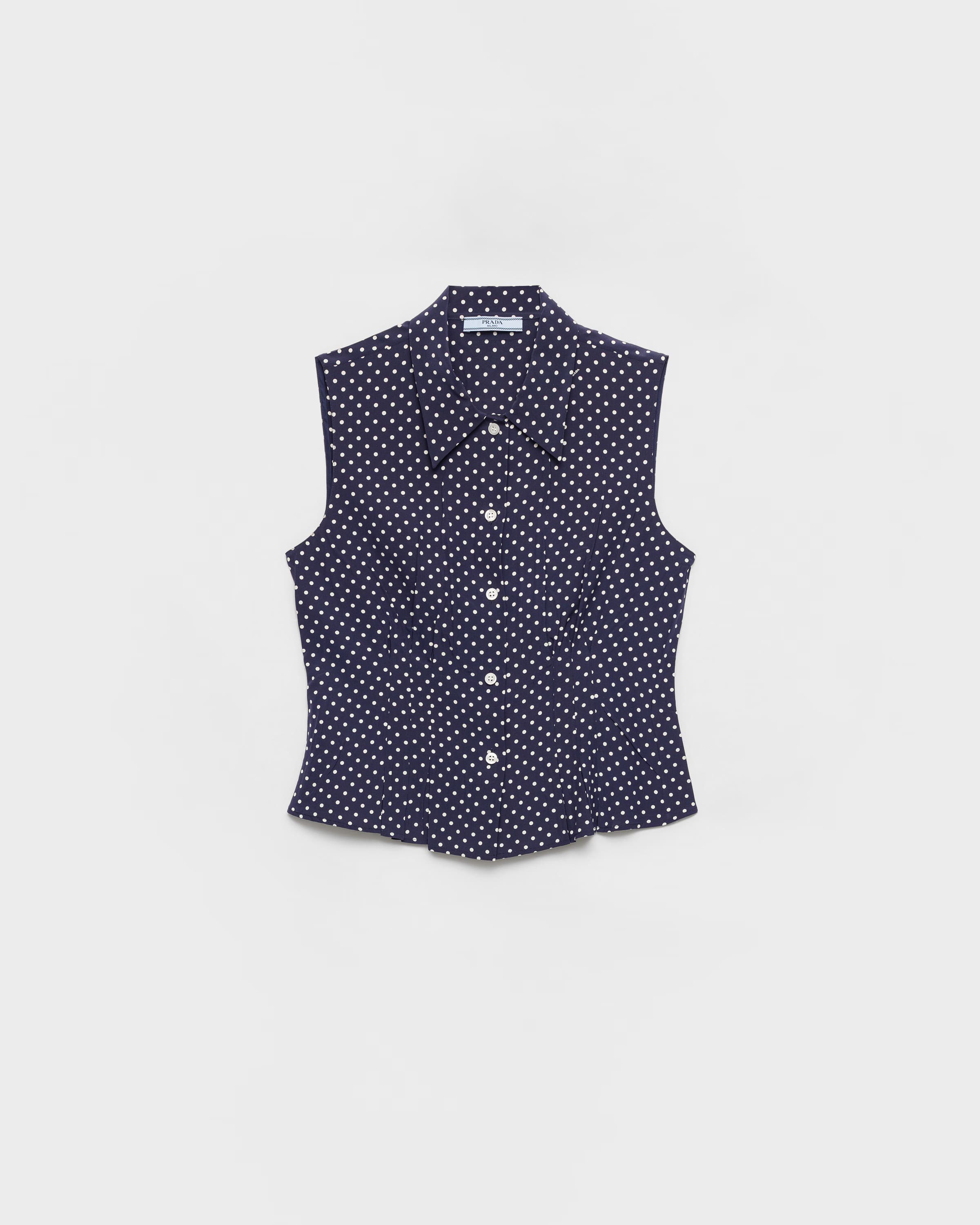Sleeveless polka-dot marocain silk shirt